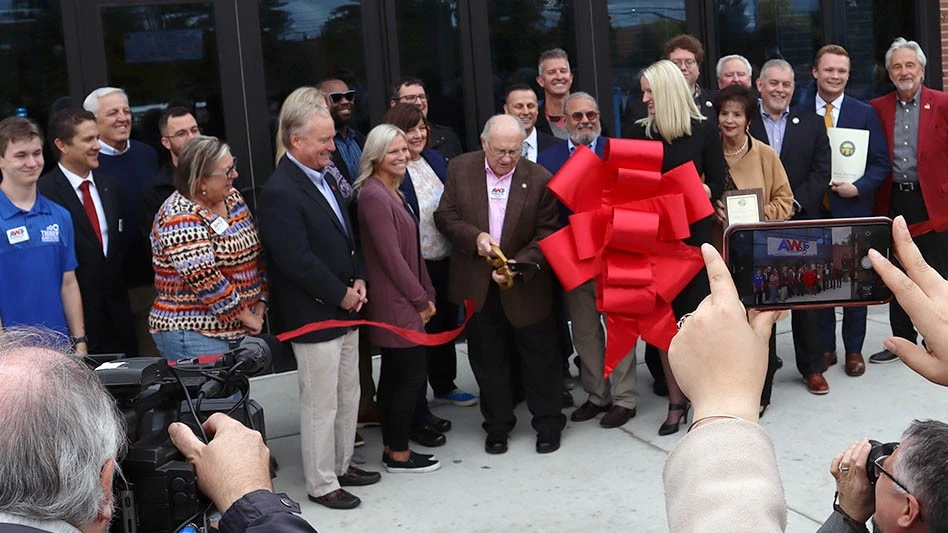 AWT Founder Roger J. Sustar cuts the ribbon at the Transformation Training Center dedication.