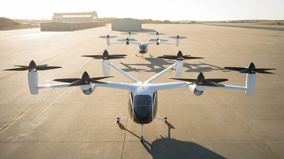 Joby’s pilot production line in Marina, California, with two of the company’s prototype aircraft.